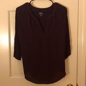 Maroon blouse.